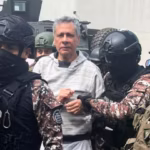 Jorge Glas, guarded by police officers upon his entry into La Roca prison in Guayaquil, Ecuador on April 7, 2024. Photo: Alina Manrique/El Pais/file photo.