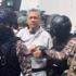 Jorge Glas, guarded by police officers upon his entry into La Roca prison in Guayaquil, Ecuador on April 7, 2024. Photo: Alina Manrique/El Pais/file photo.
