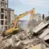 Emergency responders use an excavator to clear debris from buildings damaged by the June 24 earthquakes in La Guaira, Venezuela, July 9, 2026. Photo: Ronald Peña R/EFE.