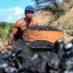 A miner transports coal at a mine in Táchira state, Venezuela. Photo: Johnny Parra/AFP/File photo.